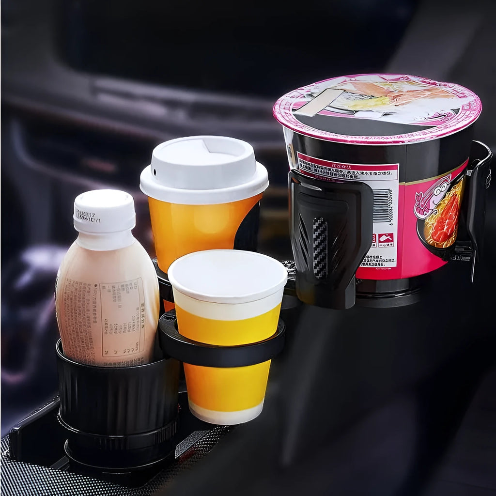 Black adjustable car cup holder with retractable base extended, showing carbon fibre pattern.