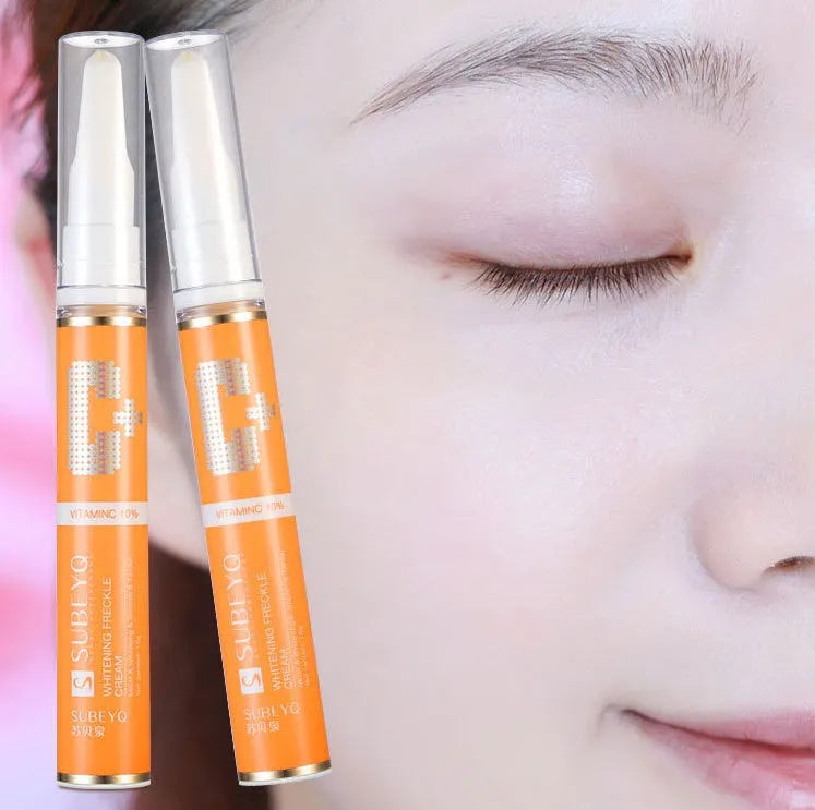 15g freckle cream in orange packaging with skin whitening and moisturising ingredients