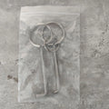Two alloy wrench tools from a portable universal family toolkit set on a white background.
