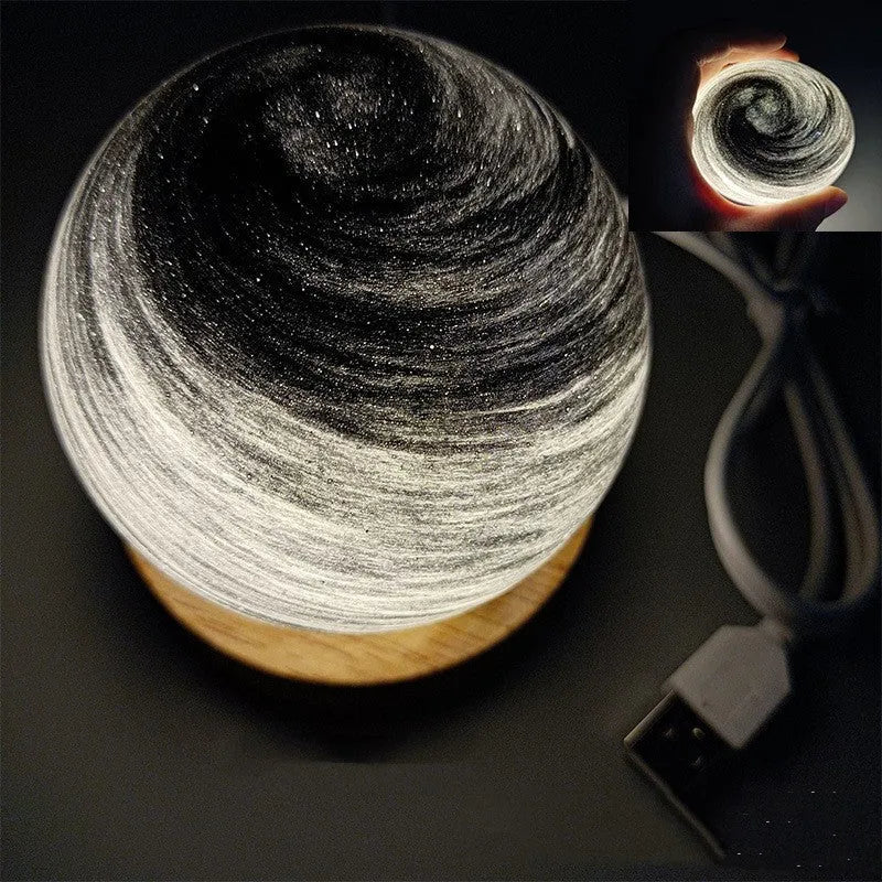 Planet-themed night light with USB cable and base, showing 80mm diameter globe