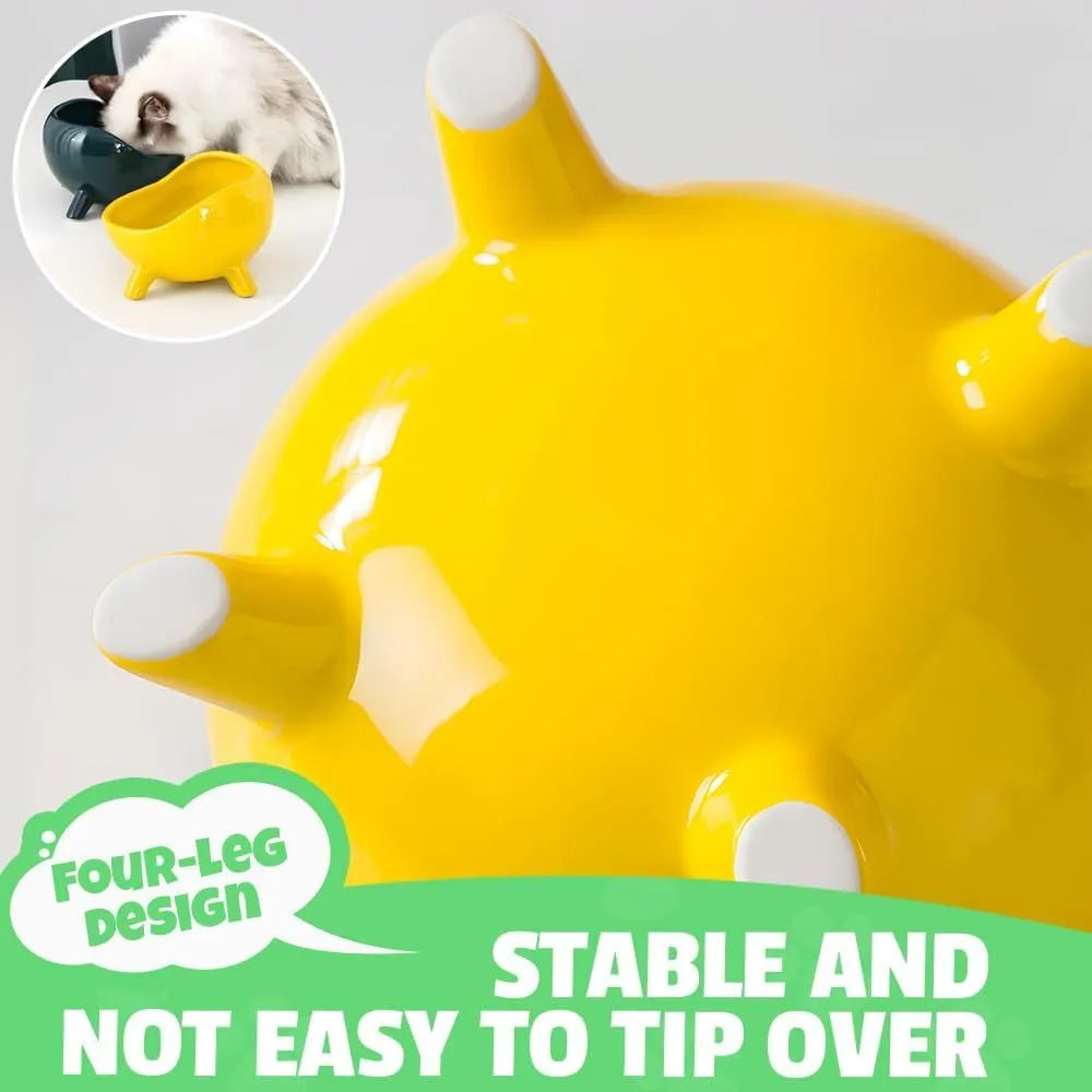 Green ceramic pet food bowl with four-legged base and rounded arc design