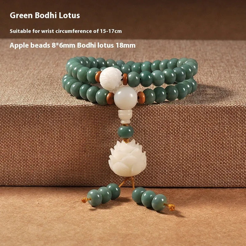 Unisex natural Bodhi seed bracelet with white jade beads and green sandalwood on a white background.