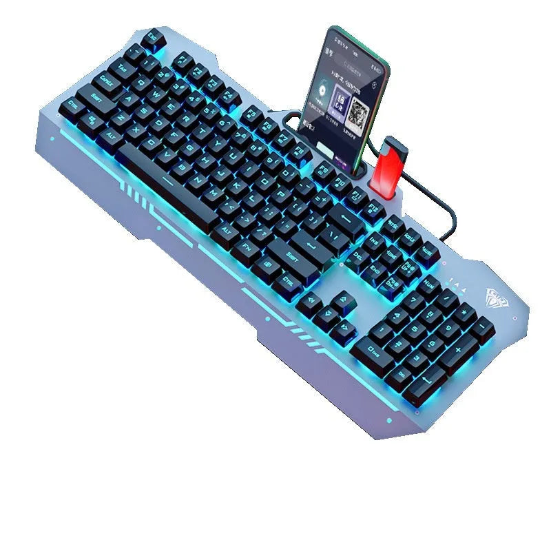 Black and white wired mechanical feeling keyboard, mouse, and headset bundle on a desk.