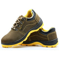 Bronze cowhide leather low-cut safety boots with a steel toe cap and solid rubber tread sole.