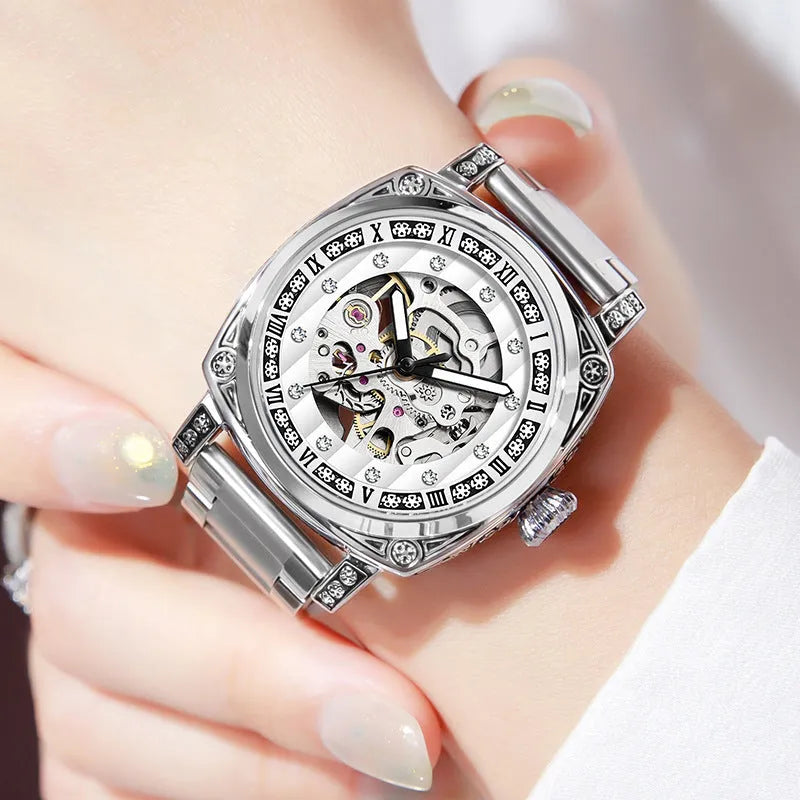 Men's black dial mechanical watch with luminous hands on a leather strap, showing 10m waterproof rating.
