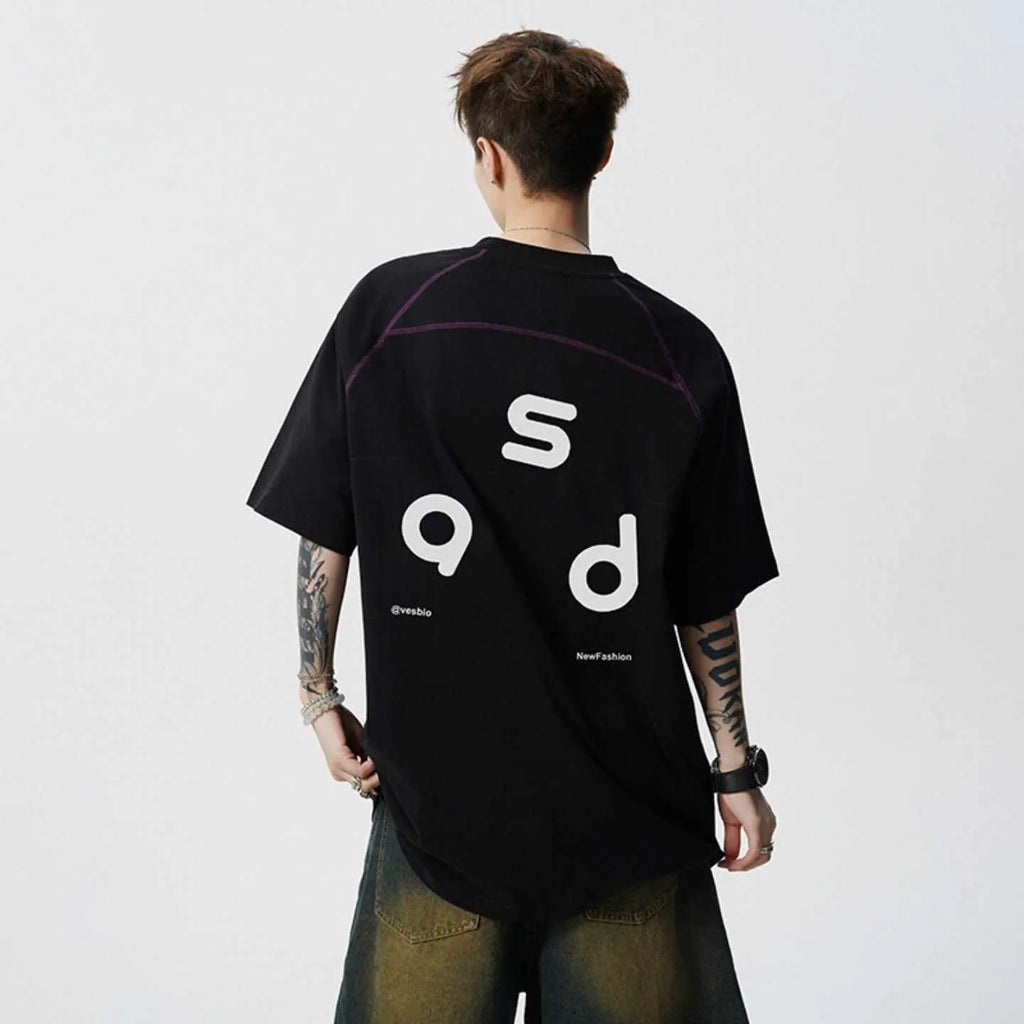 Loose fit black cotton t-shirt with a white letter print design on the front.