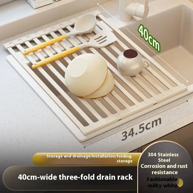 Milky white foldable stainless steel kitchen draining rack next to a sink.