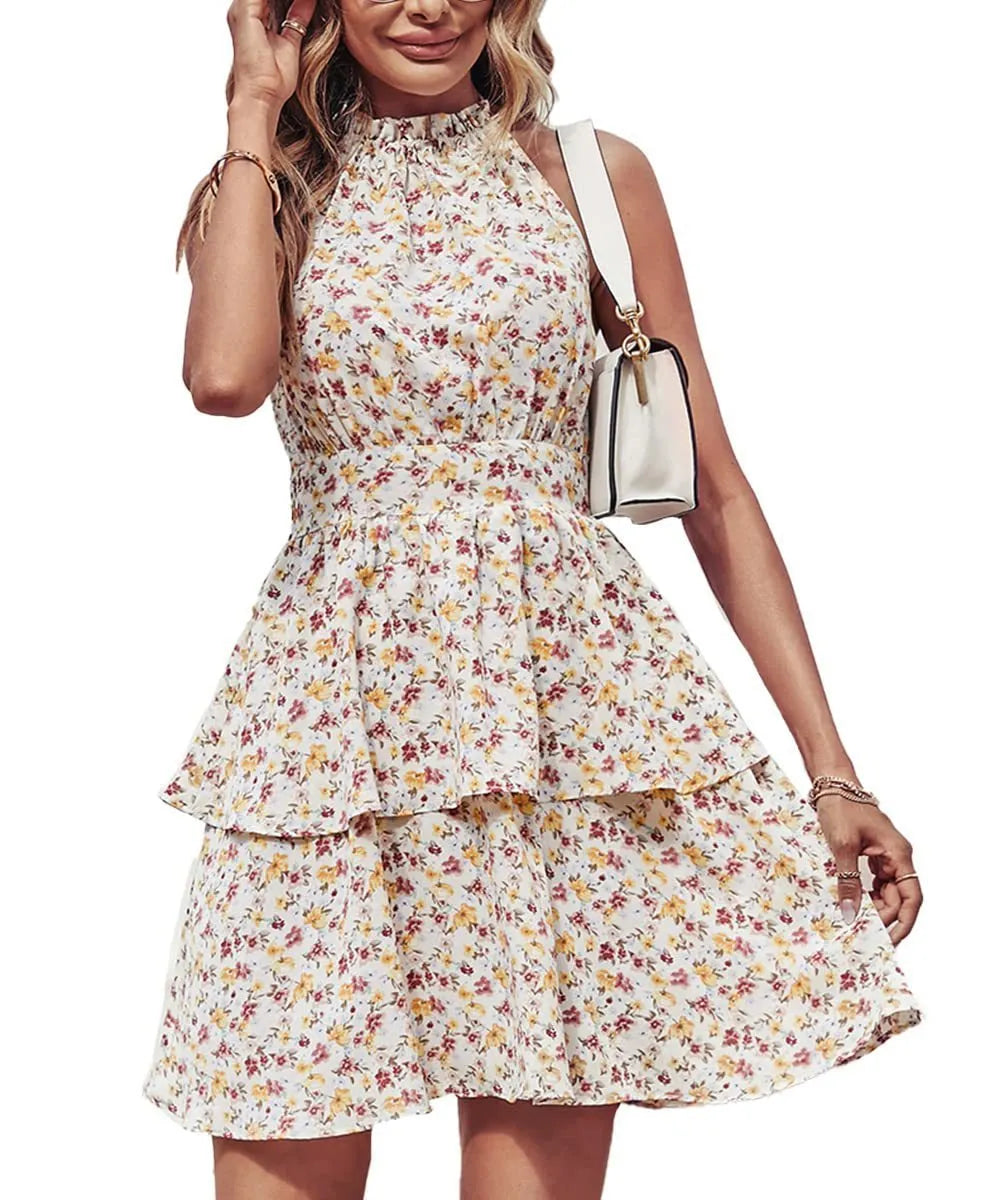 Women's summer halter dress with backless boho design and A-line ruffle detailing in printed polyester