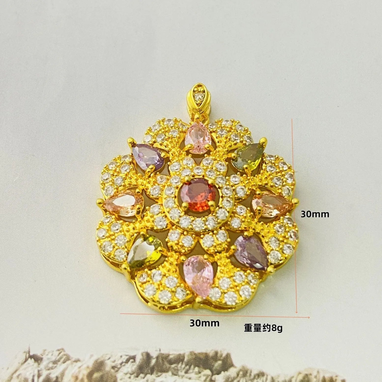 Close-up of a women's flower-shaped zircon pendant necklace in a gold electroplated finish on a model.