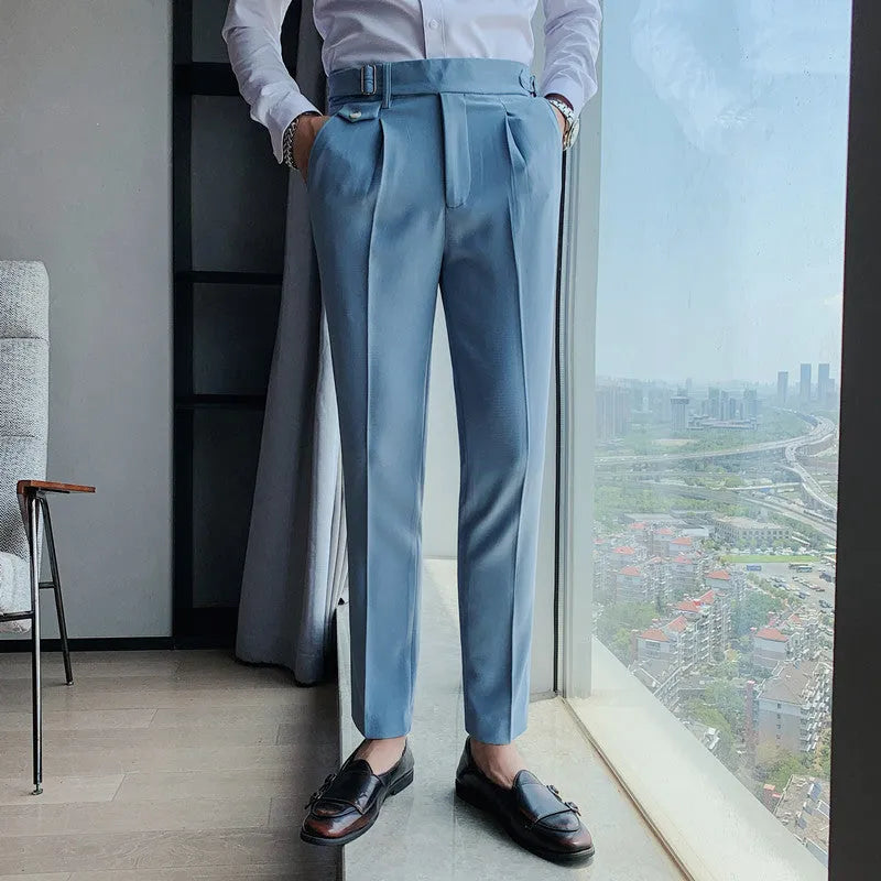 Straight leg casual trousers in solid colours on a hanger.
