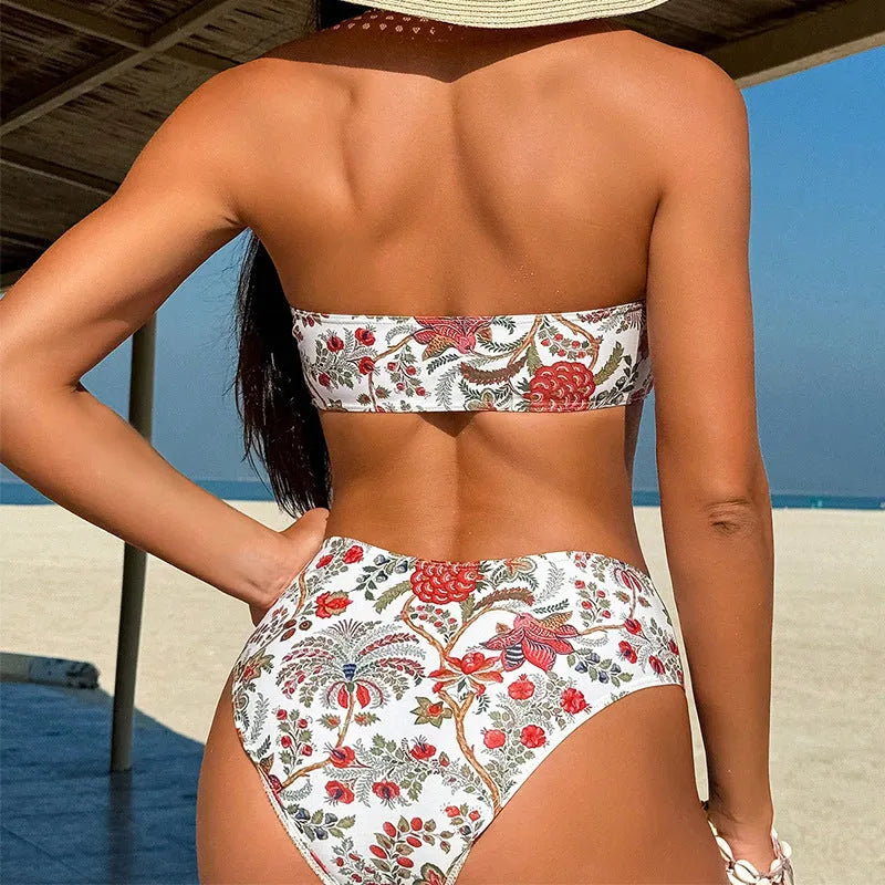 Women's printed bandeau swimsuit top with matching shorts on a neutral background.