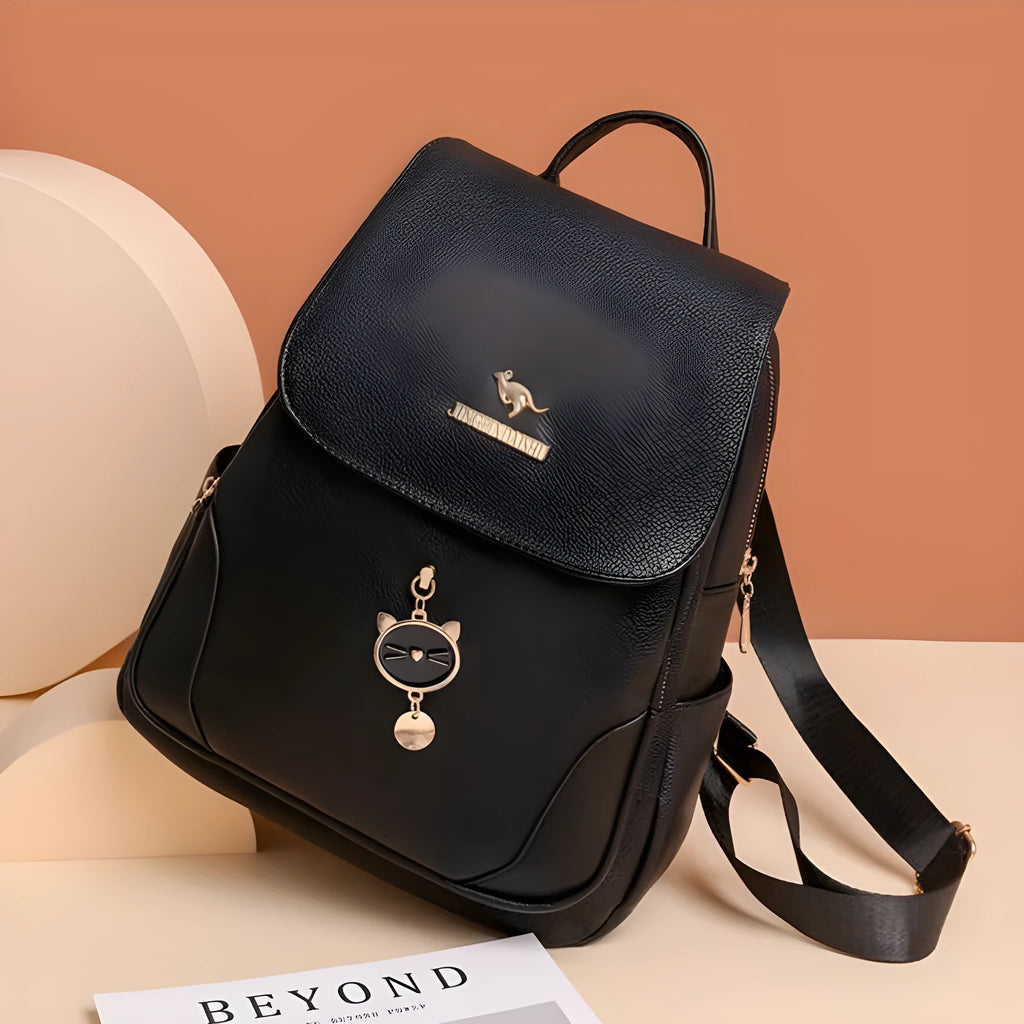 Soft PU leather women's backpack with textured finish and three-dimensional front pocket in taro purple