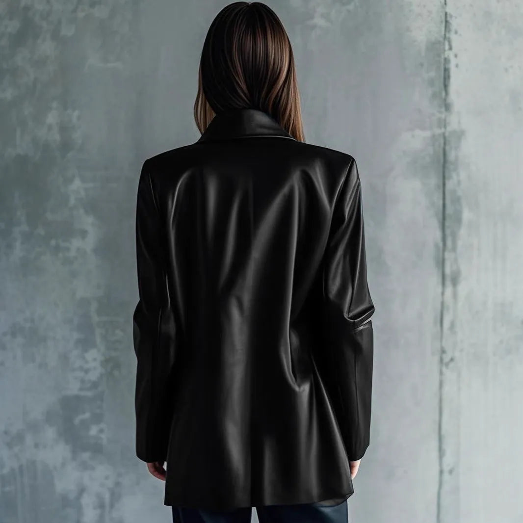 Women's black leather-style jacket with a medium 65cm length and long sleeves.