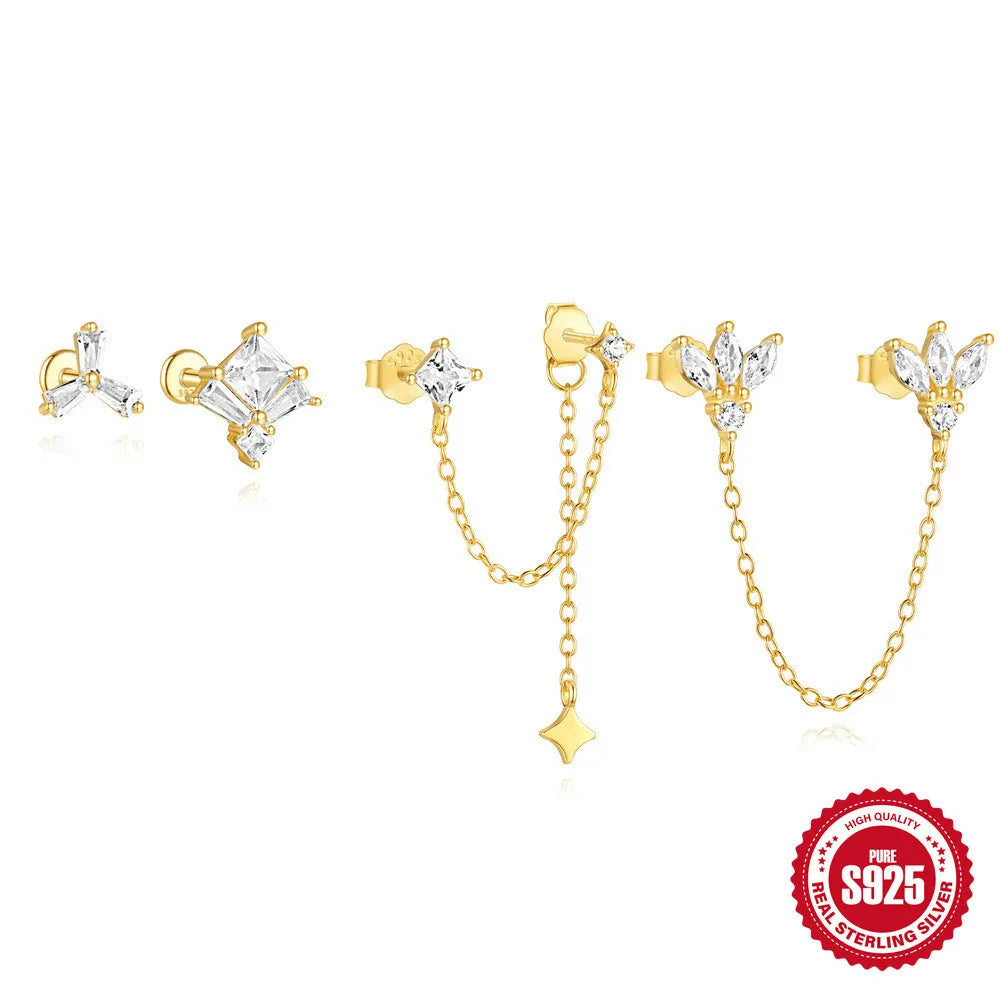 Close-up of a golden double ear piercings chain design stud earring made from S925 sterling silver with inlaid zircon stone.