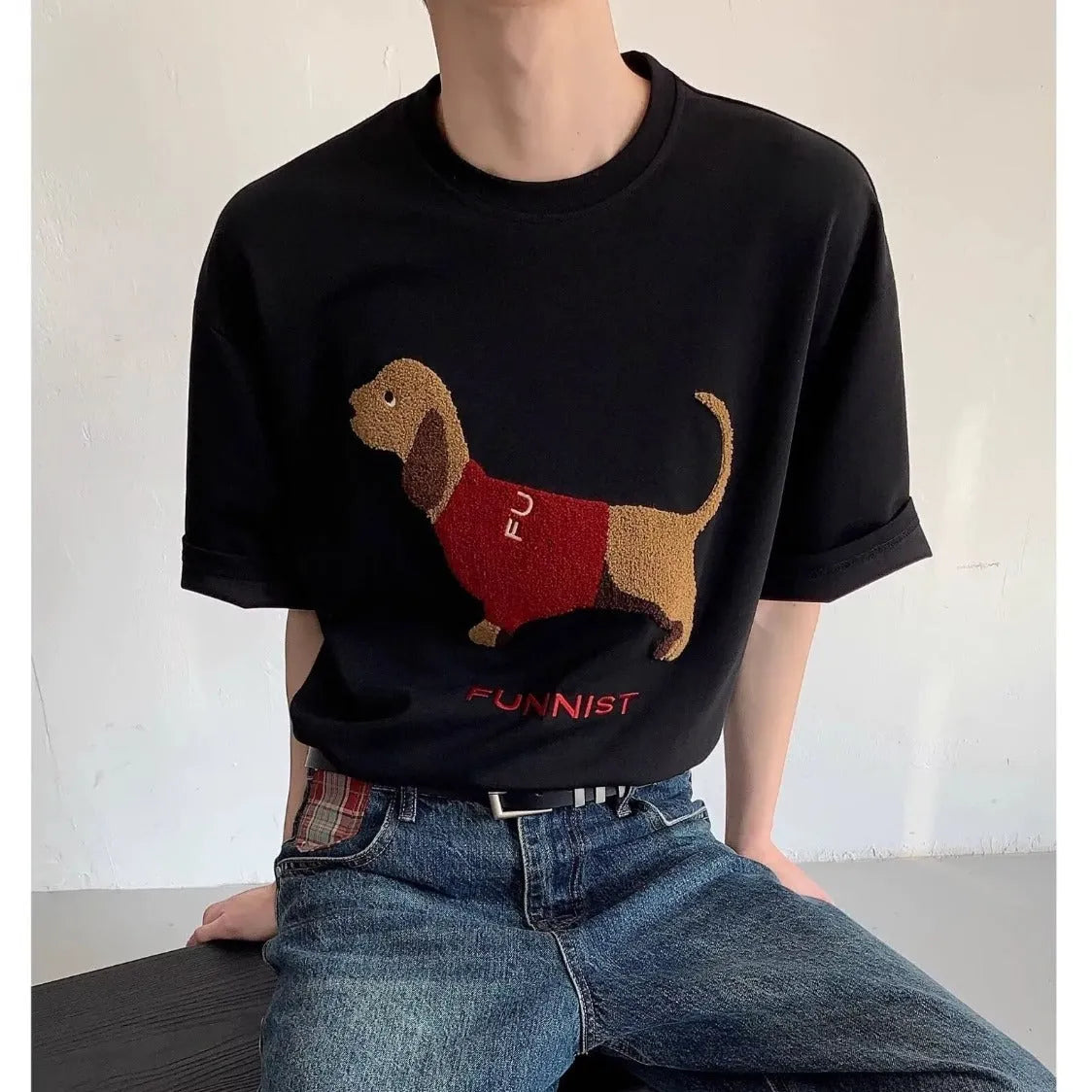 Men's grey cotton t-shirt with an embroidered black and white dachshund dog design on the chest.