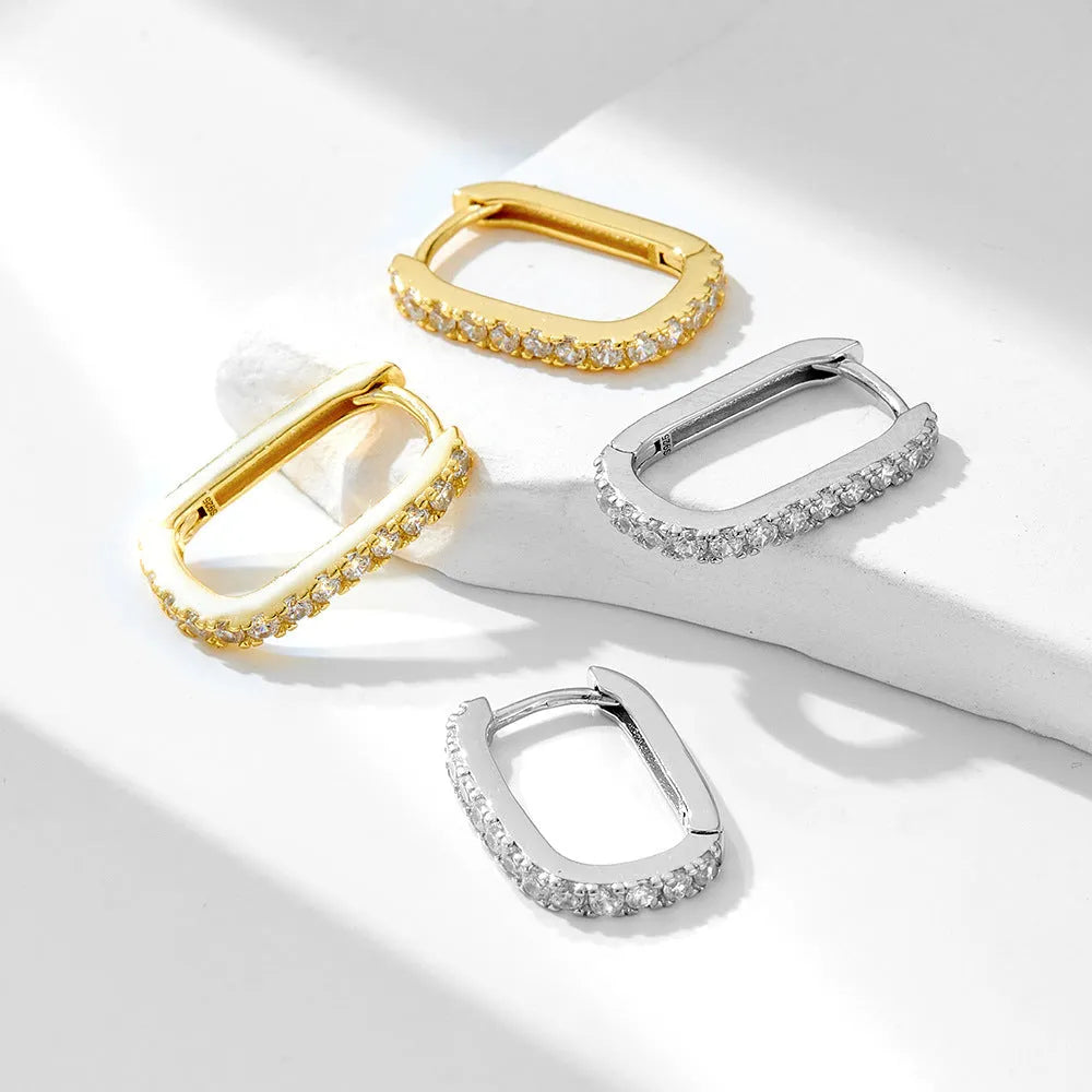 S925 sterling silver oval zircon ear clip earrings for women in yellow and white.