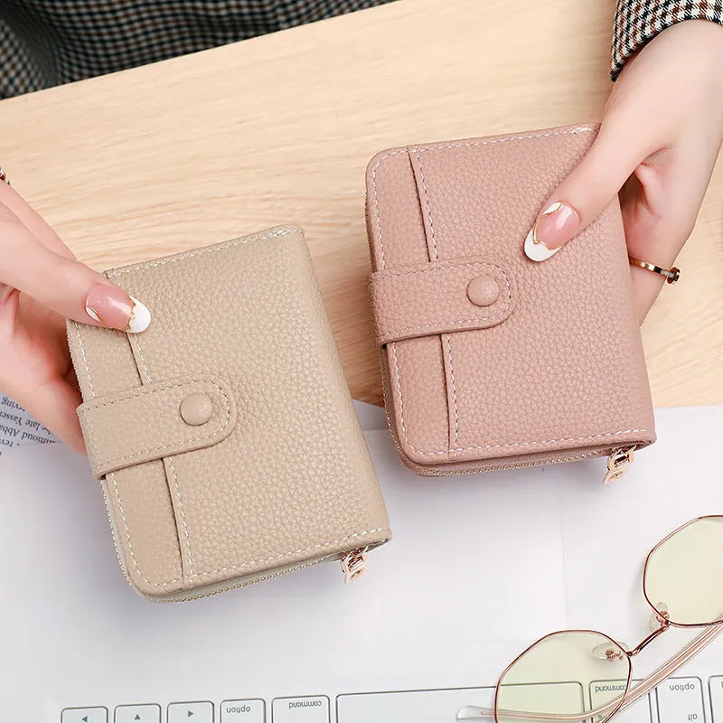 Ladies' short wallet with lychee pattern texture showing 2-fold design in beige, pink, black, and red colour options