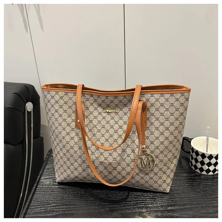 Western style black PU leather shoulder bag with sewing thread details and structured design