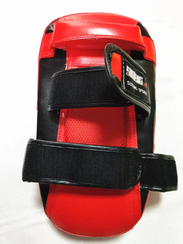 Black and red hand-held martial arts foot target with double buckle for boxing and Sanda training