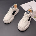 Unisex sports casual shoes with cloth upper and rubber foam sole in white, green, and black colours