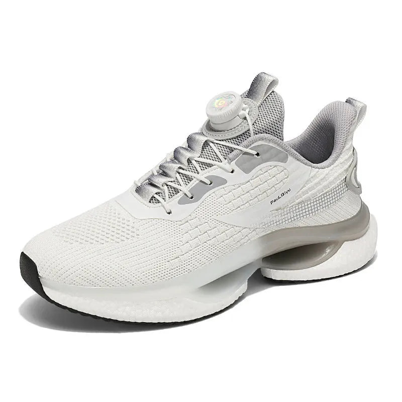 White low-top running shoes with a rotating buckle closure and Fly-knit mesh upper.