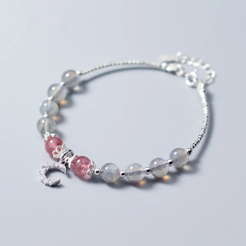 Natural moonstone adjustable bracelet with crescent moon charm showing 6mm bead and silver extension chain