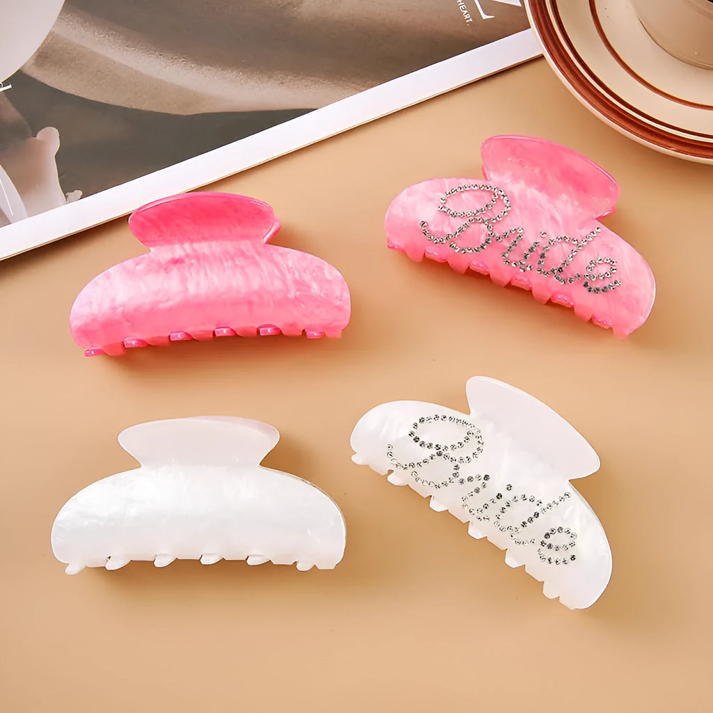 Pink and white 10cm acrylic shark hair clips with multi-diamond spot drill pattern and double-sided design