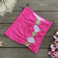 Women's solid colour one-piece swimsuit with a short skirt and hollow-out tube top design.