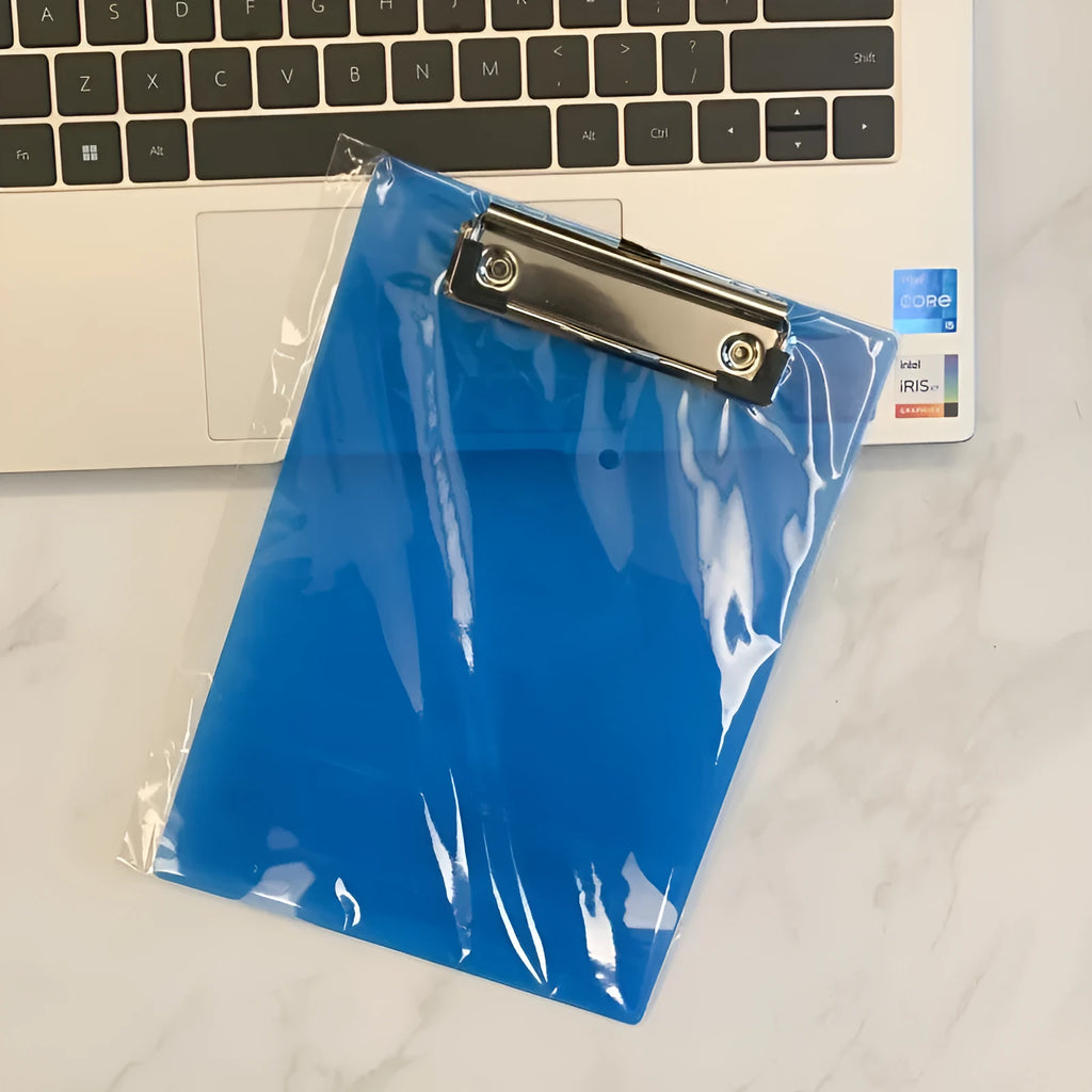 Transparent A4 writing board pad with metal clip holding paper, shown in blue colour variant.