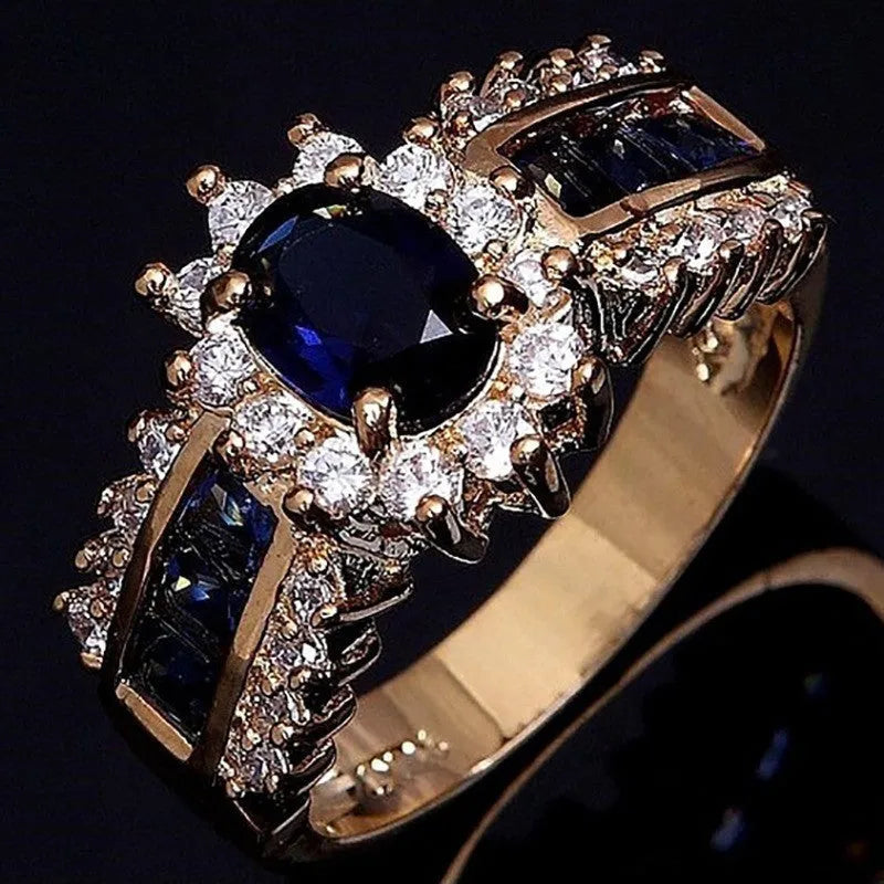 Personalised zinc alloy fashion ring with diamond and blue or purple zircon stone designs.