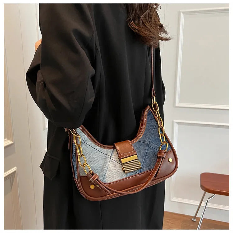 Brown denim women's bucket shoulder bag with diamond mesh pattern and chain detail