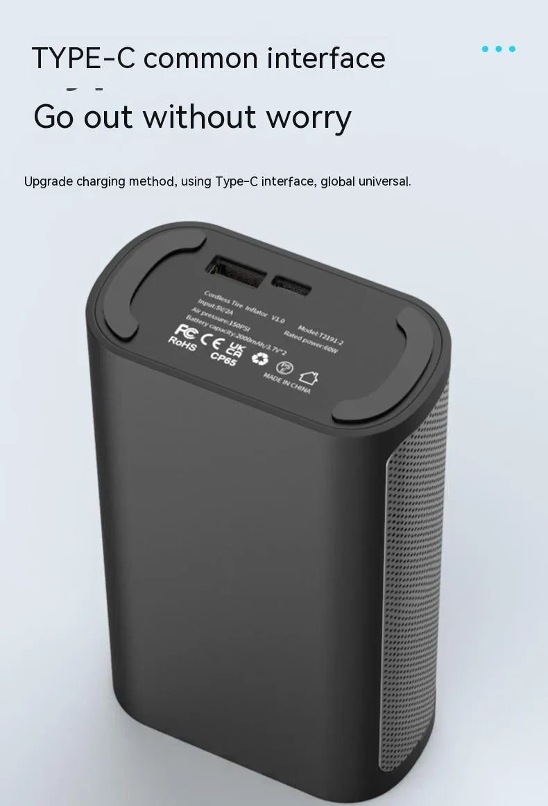 Handheld wireless digital display tyre pump with LED light and multiple nozzle attachments on a white background