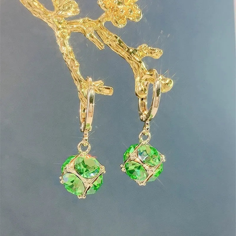 Geometric copper earrings with zircon stones in electroplated finish