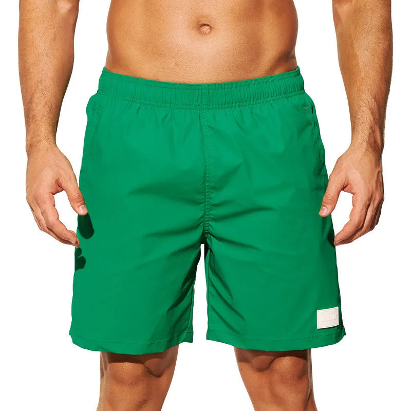 Men's quick-drying nylon sports shorts in straight leg style available in multiple colours