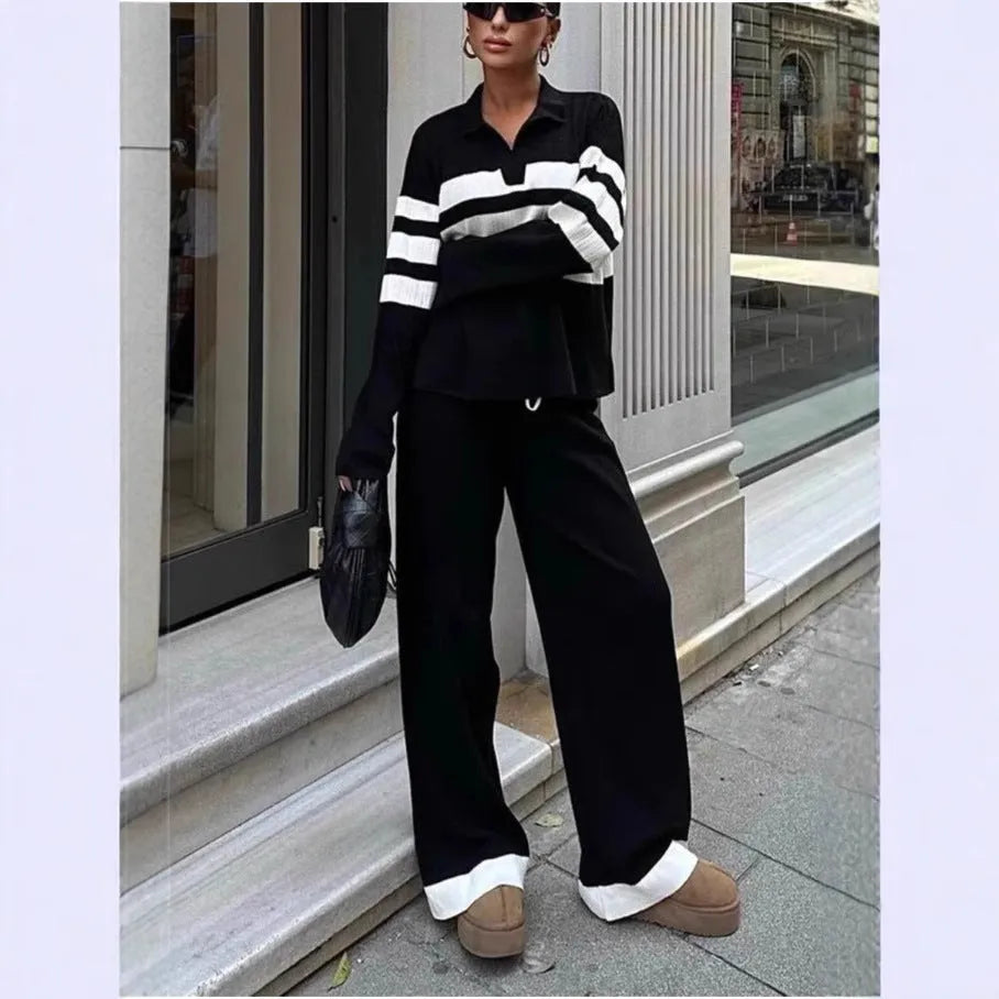 Women's black and white striped knitted polo shirt with matching trousers two-piece set