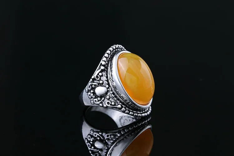 Retro geometric alloy ring with fluorescent beeswax centre and antique silver electroplated finish