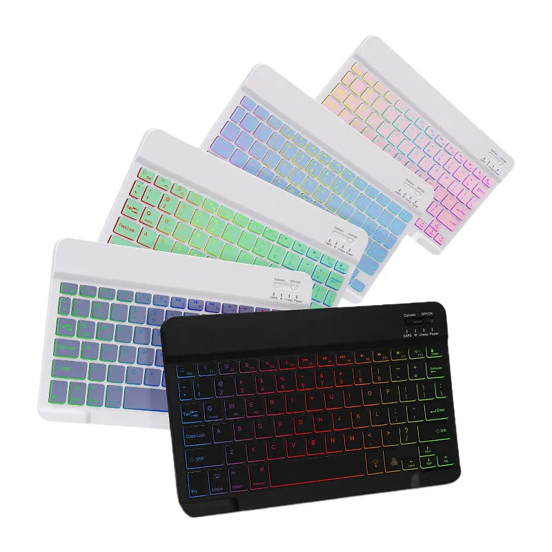 Colourful iPad leather case with attached luminous RGB backlit Bluetooth keyboard on a desk.