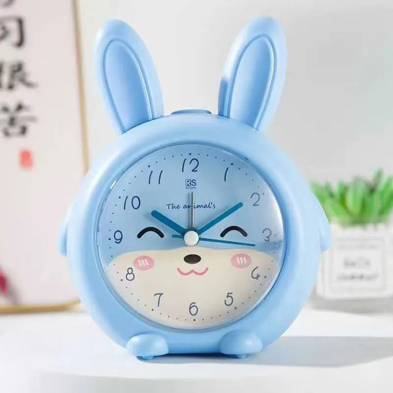 Children's cartoon alarm clock with night light in blue or pink colours, 6.5cm thick