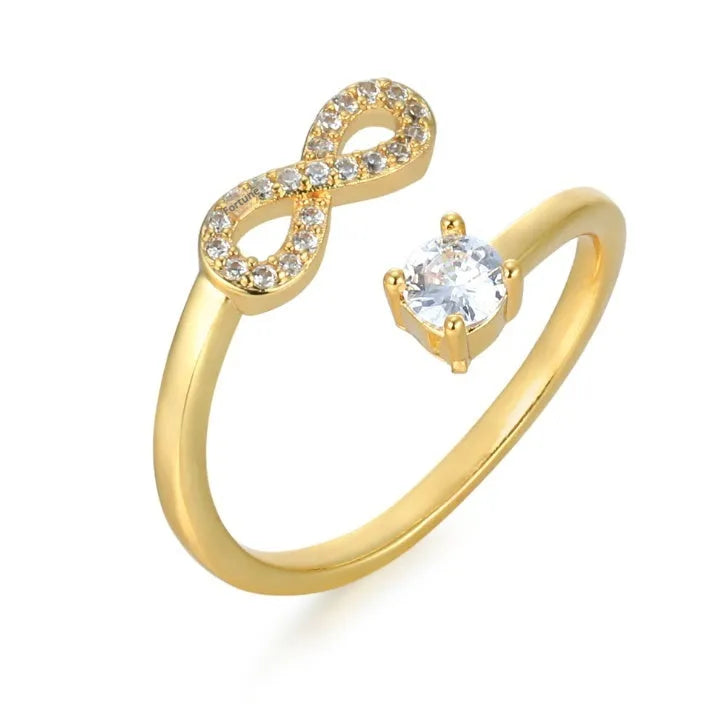 Geometric open ring with zircon inlay displaying custom English letter on metal band