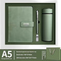 A5 notebook with imitation leather cover in multiple colour options including black, red, green, blue, and orange.