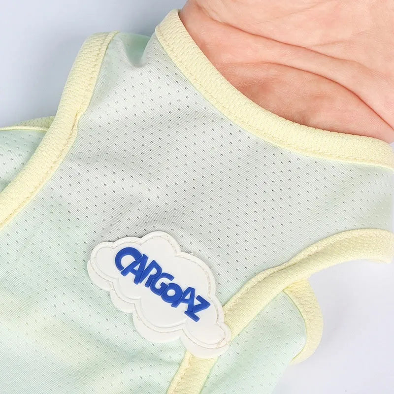Cat wearing thin polyester summer vest in grass green colour