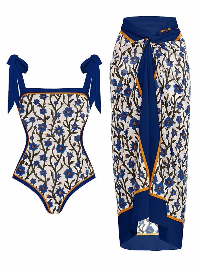 Women's printed chiffon two-piece swimsuit set with a separate hip skirt.