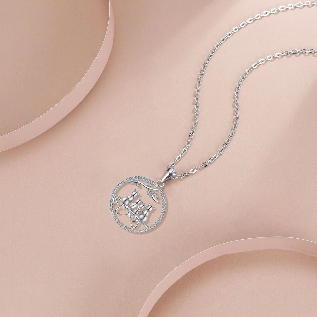 Copper necklace with four kitten pendant and cross chain style