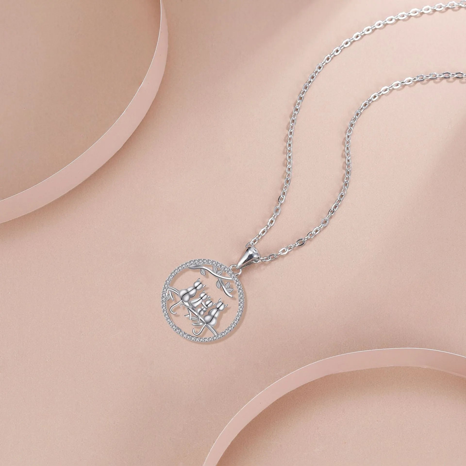 Copper necklace with four kitten pendant and cross chain style