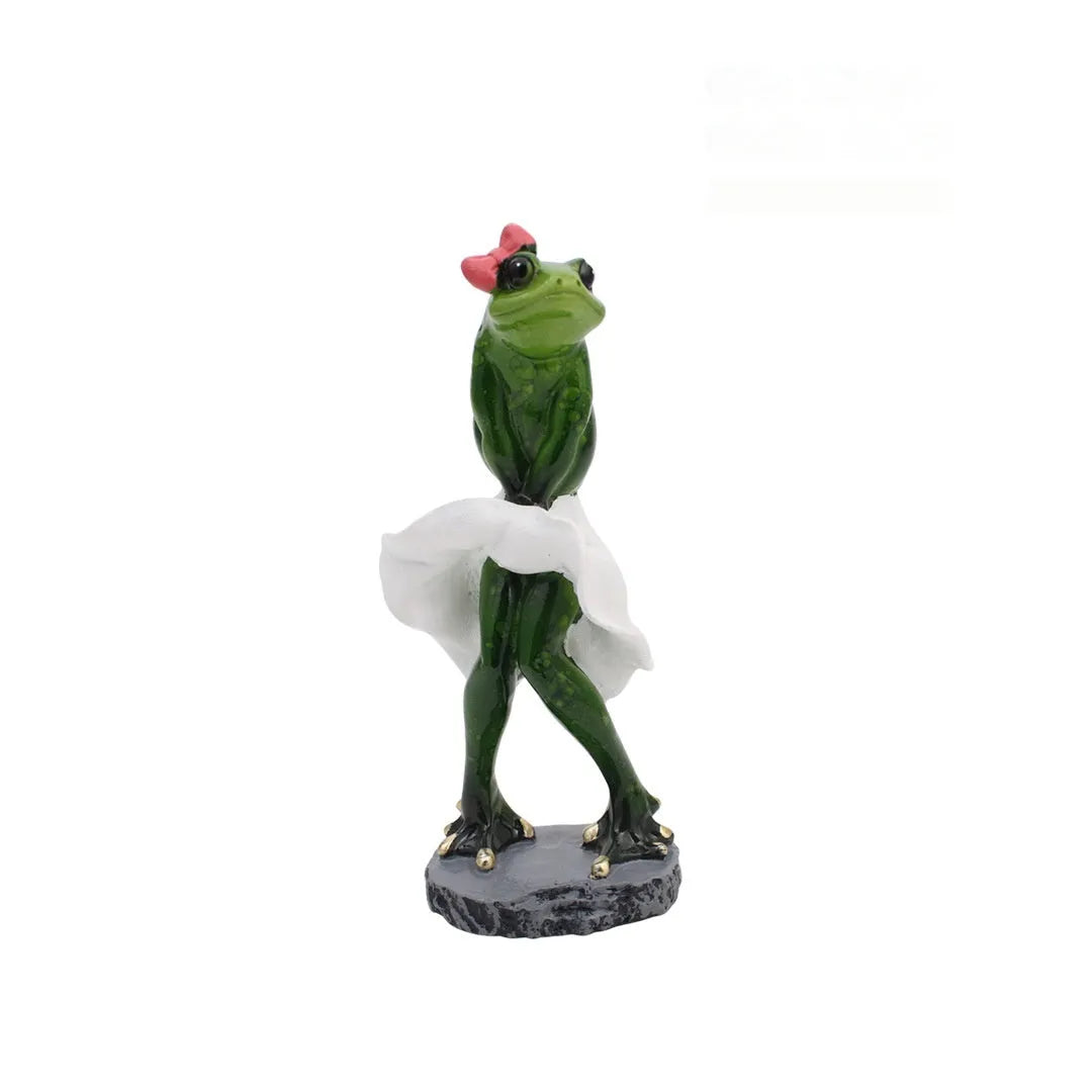 Pastoral style synthetic resin frog figurine home decoration on a wooden surface.