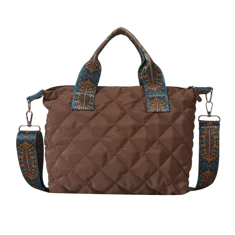 Soft horizontal square Oxford cloth shoulder messenger bag in green with embroidery detail and a single strap.