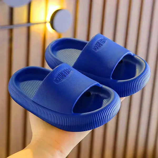 Children's mixed colour EVA slippers with non-slip soles showing size options from 15.5cm to 21.5cm