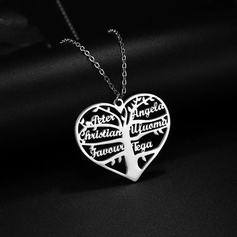 Custom stainless steel name necklace with hollow heart and lucky tree pendant in silver, gold, or rose gold.