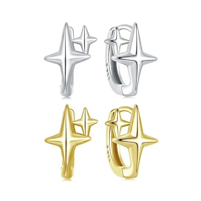 Sterling silver minimalist star design clip-on earrings with XINGX detail and oxidation finish.
