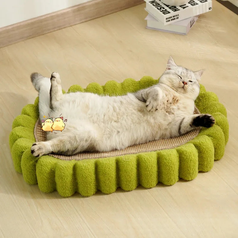 Green oval cat scratcher bowl bed with sisal scratching surface measuring 65cm